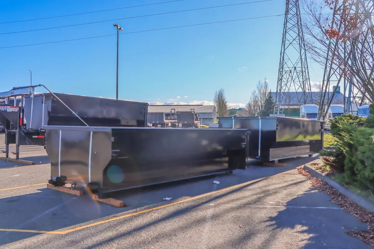 Roll-off dumpster ready for waste disposal at job site for Construction Dumpster Rental in Pecan Plantation